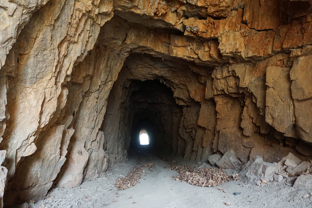 Hand-hewn interior of the 77-metre railway tunnel that passed through MacGregor Hill